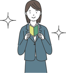 初心者マークを持ったスーツを着た女性