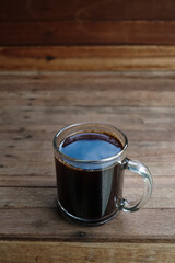 black coffee on a wooden table