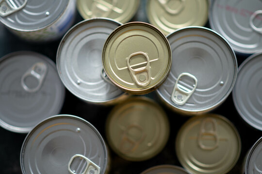 Closeup of a group of aluminium cans.