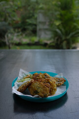 Corn cakes or also called corn fritters are Indonesian food made from corn, flour, chicken eggs and fried