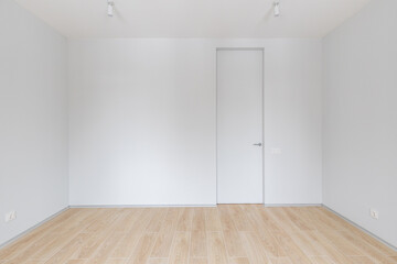 Empty gray room ready for people to move in