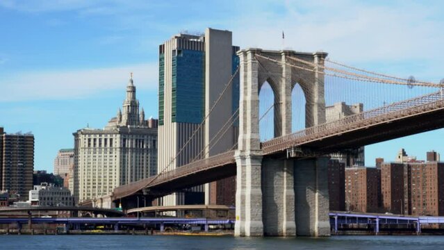 Brooklyn Bridge with Manhattan skyline in background in New York City