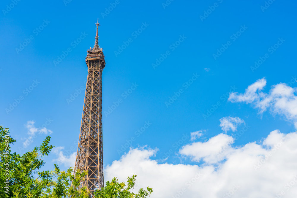 Sticker top of eiffel tower seen from the park in paris. france