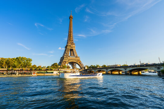 Beautiful view of Eiffel Tower by Seine river in Paris. France