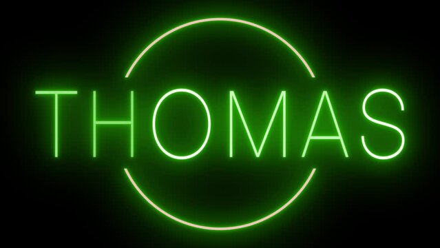 Flickering green retro neon sign glowing against a black background for THOMAS