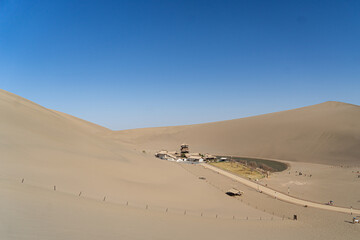 Fototapeta na wymiar Crescent spring in Dunhuang, desert and sky