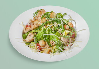 isolated tasty salad with chicken and arugula and mix vegetables, cheese for menu design