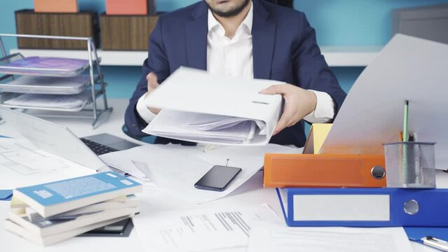 Lazy office worker is reckless and angry.
The office worker, who is distracted and lazy, does not do his work, does not care.
