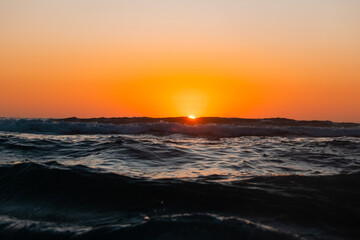 Fototapeta na wymiar Clear sunrise sky over the ocean.