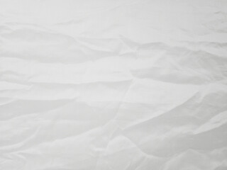 Soft white wrinkled fabric background