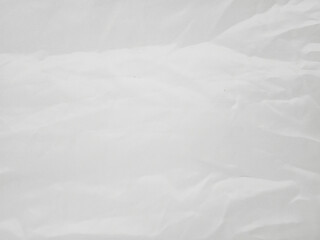 Soft white wrinkled fabric background