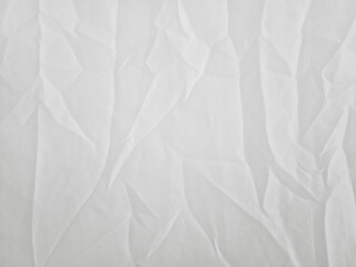 Soft white wrinkled fabric background