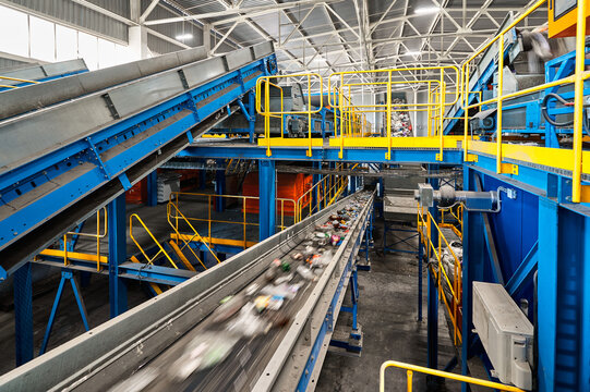 Conveyor belt transports sorted litter at recycling plant
