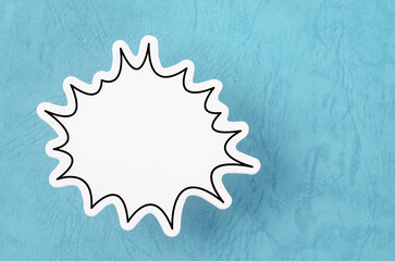 The Blank white speech bubble isolated on blue background.