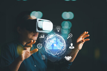 Businesswoman wearing VR glasses and accessing the Cloud Computing Technology Internet Storage Network Concept And a large database big data Through internet technology. Metaverse technology idea.