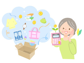 フリーマーケットで商品が売れて喜ぶミドル女性