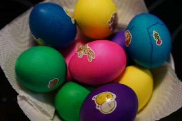 Fototapeta na wymiar Handmade Colored Easter eggs with natural dye close-up, traditional Christian Easter concept
