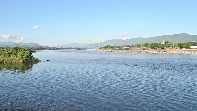 View of the Golden Triangle area where the borders of Thailand, Laos, and Myanmar (Burma) meet at the Ruak and Mekong rivers view from Chiang Saen district in Chiang Rai province of Thailand.