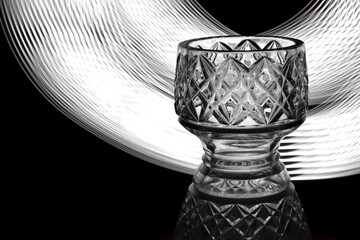 Black and white sketch with a crystal vase