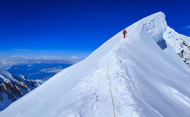 A climber reaching the summit of Mt Denali in Alaska, the highest peak in North America