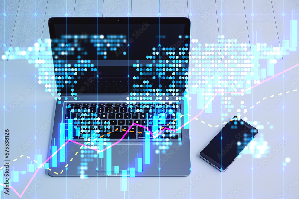 Poster close up of laptop and cellphone on desktop with glowing candlestick forex chart map hologram on blu
