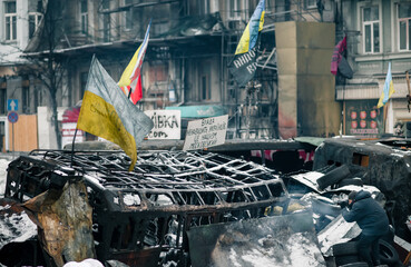 Revolution of Dignity in Ukraine. Burned bus on the barricades in Kyiv during Maidan revolution in 2014
