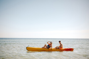 Fototapeta na wymiar person kayaking in the sea