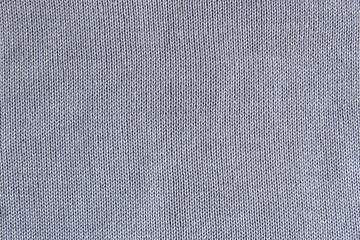 Abstract texture of bright solid color knitted surface.	