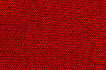 Abstract texture of bright solid color knitted surface.