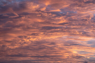 Naklejka na ściany i meble Stunning colorful vibrant sunset sky for use as background or element in composites