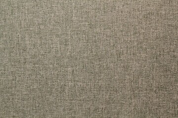 Abstract design background of grey coarse-grained intersection texture of rough fabric with an interlacing. Linen sack textile canvas burlap cloth. Close-up, mock up, top view