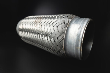 Close-up Selective focus picture with noise effect of exhaust pipe flexible connector.