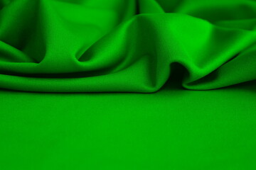 Bright thin knitted fabric with drapery with space for text.