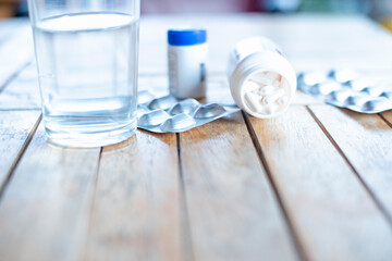 Prescriptions for medicines, medical pills in healthy containers, pharmacy theme, pill capsules with antibiotics, pills in the package.