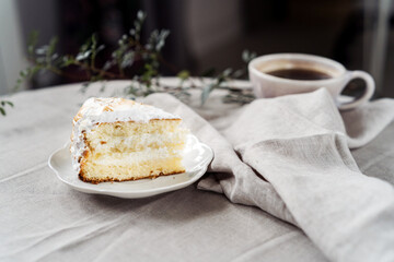 Slice of lemon meringue pie served on the table
