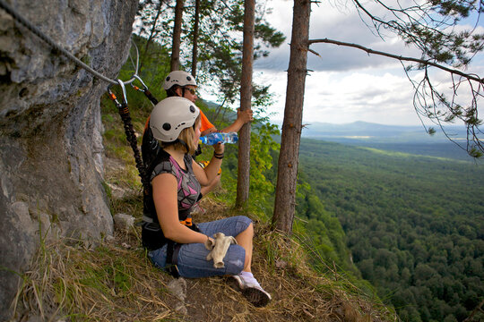 People resting after climbing, Guam gorge, Krasnodar Krai, Russia