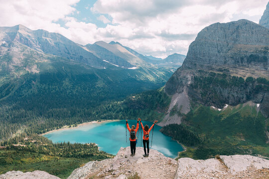 Girls hiking incredible Glacier National Park - Powered by Adobe