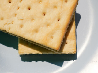 Close-up of crackers stacked on a plate