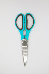 Scissors on the white background