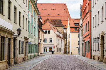 Fototapeta na wymiar Old empty street of historical Pirna old town, close to Dresden, Germany