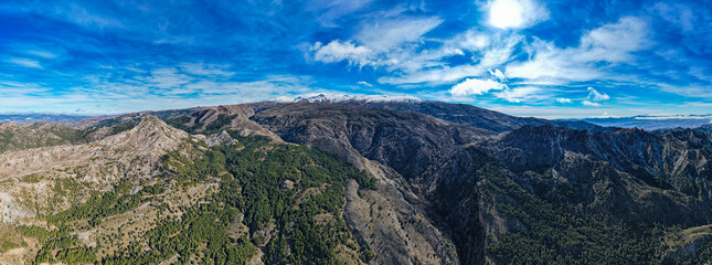 Aerial view of the mountains and valleys in the Sierra Nevada mountains in Spain