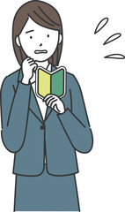 初心者マークを持ち焦っているスーツ姿の女性