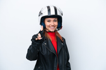 Young Russian girl with a motorcycle helmet isolated on white background showing and lifting a finger