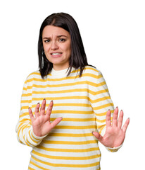 Young caucasian woman isolated rejecting someone showing a gesture of disgust.