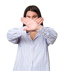 Young caucasian woman isolated doing a denial gesture