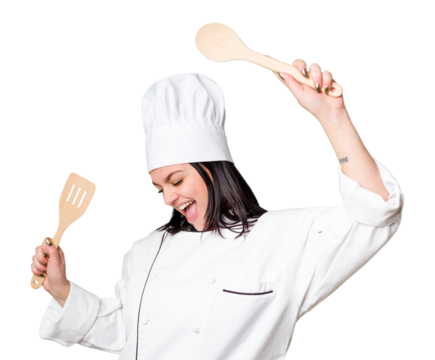 Young cook woman holding wooden spoon and fork isolated