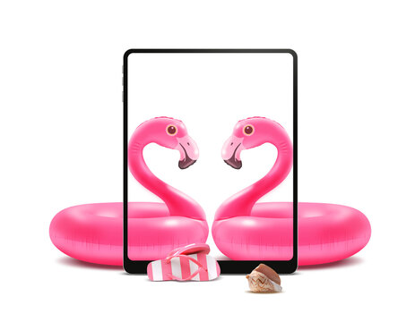 Loving inflatable flamingos and digital tablet