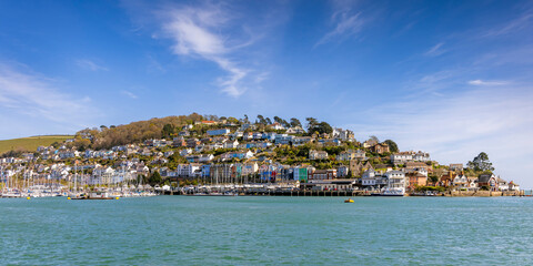 A panoramic view of Kingswear and its colourful buildings from across the River Dart in Dartmouth,...