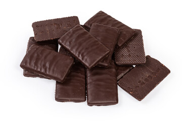 Slices of dark chocolate with filling on a white background