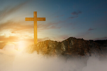 Christian Cross on the rock hill
